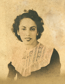 A digital scan of a physical photo of my grandmother circa 1940s.